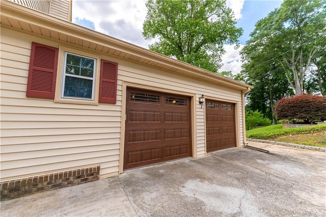 garage with driveway