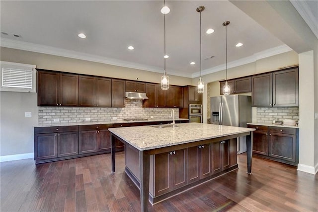 12095 Cameron Dr, Duluth, GA 30097 - kitchen with appliances with stainless steel finishes, tasteful backsplash, dark brown cabinetry, under cabinet range hood, and ornamental molding