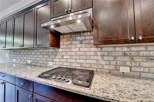12095 Cameron Dr, Duluth, GA 30097 - kitchen featuring ventilation hood, stainless steel gas cooktop, light stone counters, and decorative backsplash