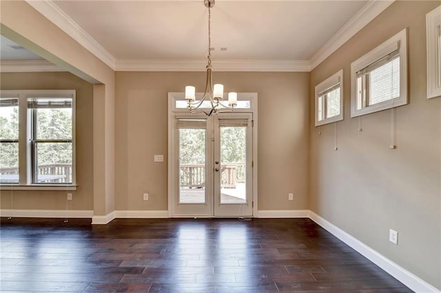 12095 Cameron Dr, Duluth, GA 30097 - doorway featuring a chandelier, dark wood-style flooring, crown molding, and baseboards