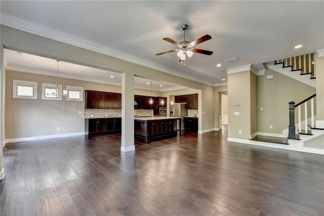 12095 Cameron Dr, Duluth, GA 30097 - unfurnished living room with a ceiling fan, dark wood-style flooring, stairway, baseboards, and crown molding