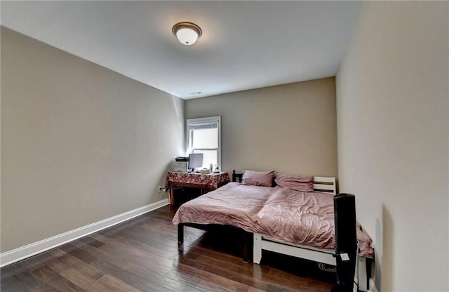 12095 Cameron Dr, Duluth, GA 30097 - bedroom with dark wood-style flooring and baseboards