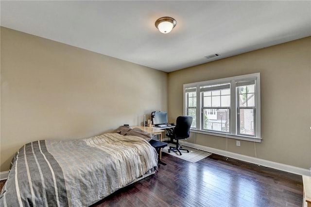 12095 Cameron Dr, Duluth, GA 30097 - bedroom with baseboards, wood-type flooring, and a desk