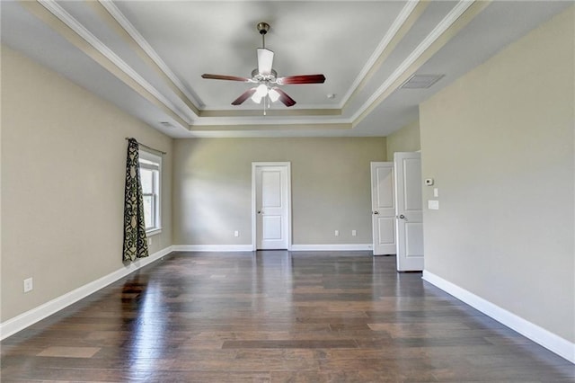 12095 Cameron Dr, Duluth, GA 30097 - empty room with a tray ceiling, a ceiling fan, dark wood-style floors, ornamental molding, and baseboards