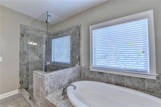 12095 Cameron Dr, Duluth, GA 30097 - full bath featuring a shower stall, a bath, plenty of natural light, and tile patterned floors