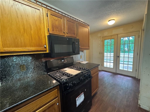 134 Summer Lake Dr, Dallas, GA 30157 - kitchen featuring black appliances, french doors, dark wood finished floors, tasteful backsplash, and a textured ceiling