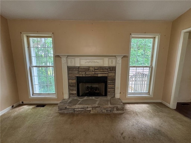 134 Summer Lake Dr, Dallas, GA 30157 - unfurnished living room featuring carpet, baseboards, and a fireplace