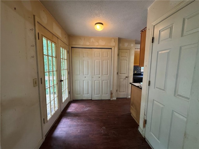 134 Summer Lake Dr, Dallas, GA 30157 - entrance foyer featuring a textured ceiling, plenty of natural light, and dark wood-type flooring