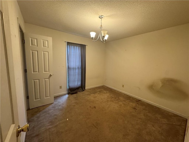 134 Summer Lake Dr, Dallas, GA 30157 - unfurnished room with a chandelier, carpet flooring, baseboards, and a textured ceiling
