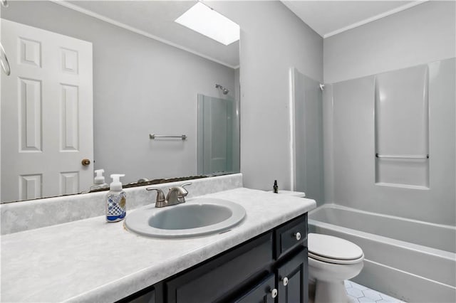 full bath featuring a skylight, toilet, vanity, and shower / bathing tub combination