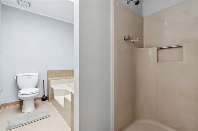 full bathroom with tile patterned flooring, a shower stall, toilet, and a garden tub