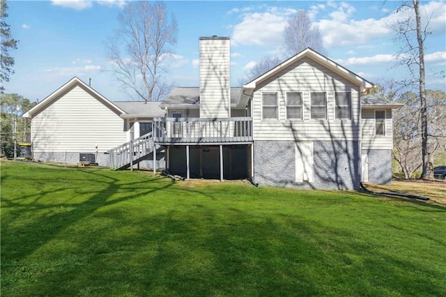 rear view of property with stairs, a wooden deck, a yard, and a chimney