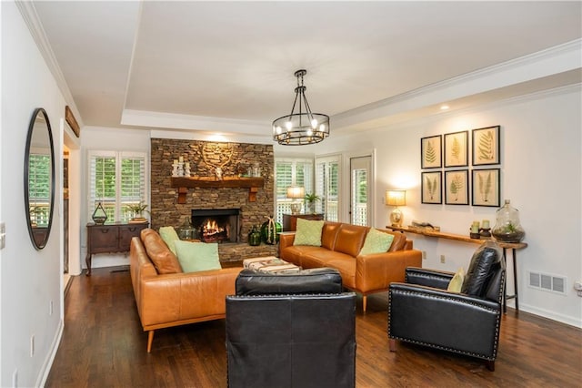 210 Hunters Vw, Roswell, GA 30075 - living room featuring dark wood-style flooring, a raised ceiling, ornamental molding, a chandelier, and a fireplace