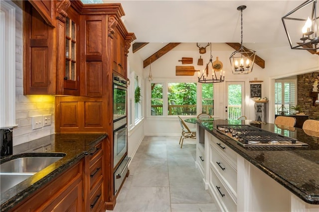 210 Hunters Vw, Roswell, GA 30075 - kitchen with a chandelier, a warming drawer, healthy amount of natural light, and decorative backsplash