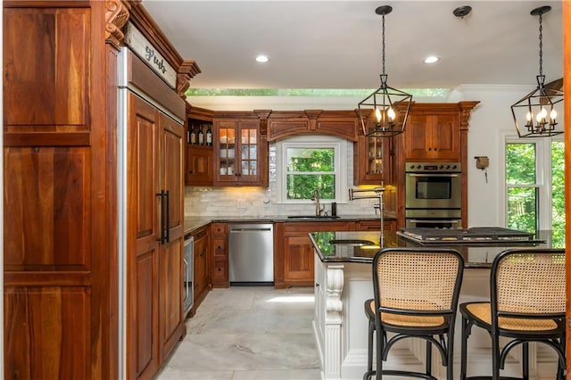 210 Hunters Vw, Roswell, GA 30075 - kitchen with appliances with stainless steel finishes, a chandelier, a breakfast bar area, decorative backsplash, and glass insert cabinets