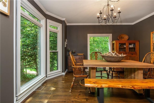210 Hunters Vw, Roswell, GA 30075 - dining area featuring a chandelier, dark wood finished floors, and crown molding