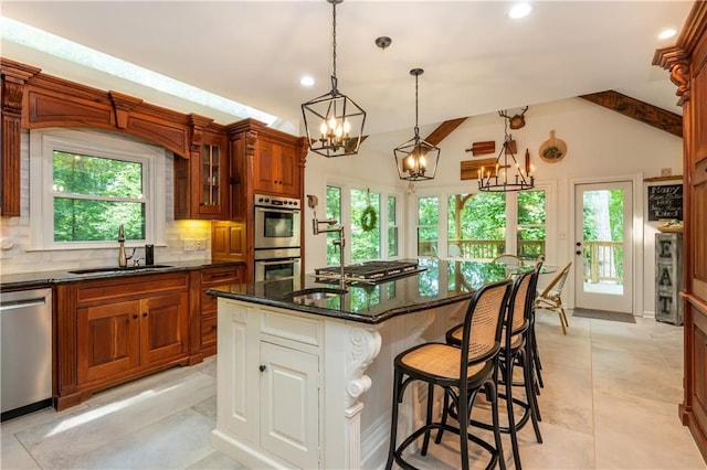 210 Hunters Vw, Roswell, GA 30075 - kitchen with stainless steel appliances, a chandelier, backsplash, plenty of natural light, and recessed lighting