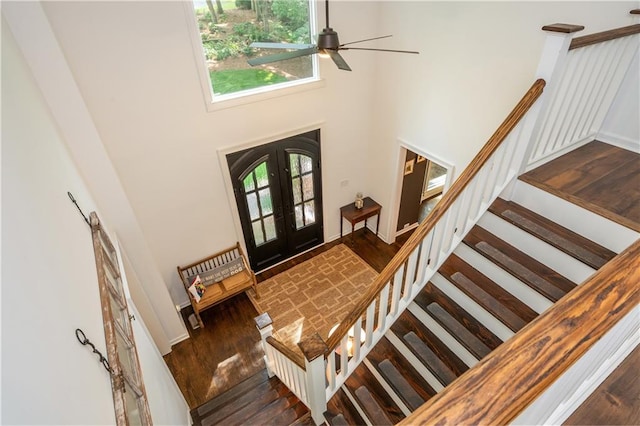 210 Hunters Vw, Roswell, GA 30075 - entryway with french doors, stairs, a towering ceiling, a ceiling fan, and wood finished floors