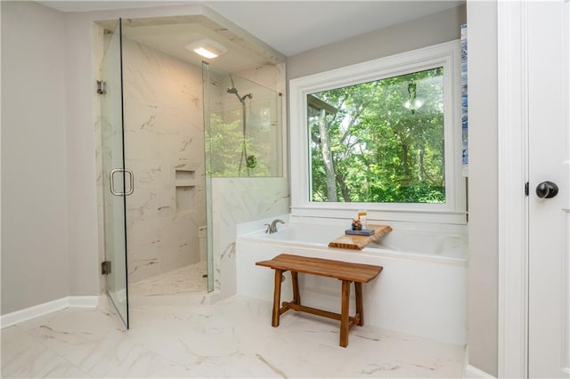 210 Hunters Vw, Roswell, GA 30075 - bathroom featuring marble look tile flooring, a freestanding tub, and a marble finish shower