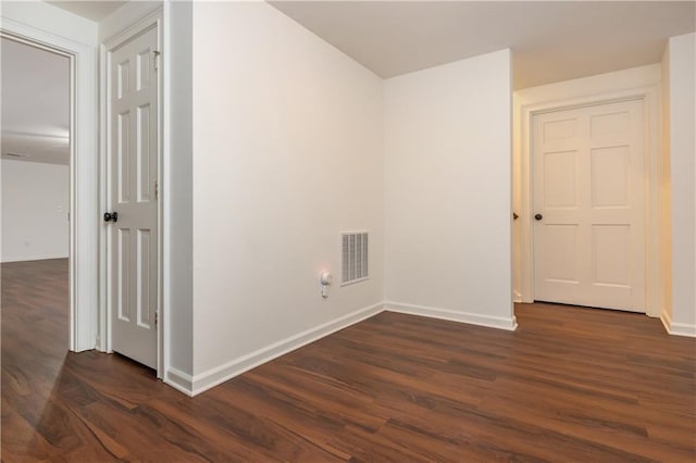 210 Hunters Vw, Roswell, GA 30075 - spare room featuring baseboards and dark wood-style floors