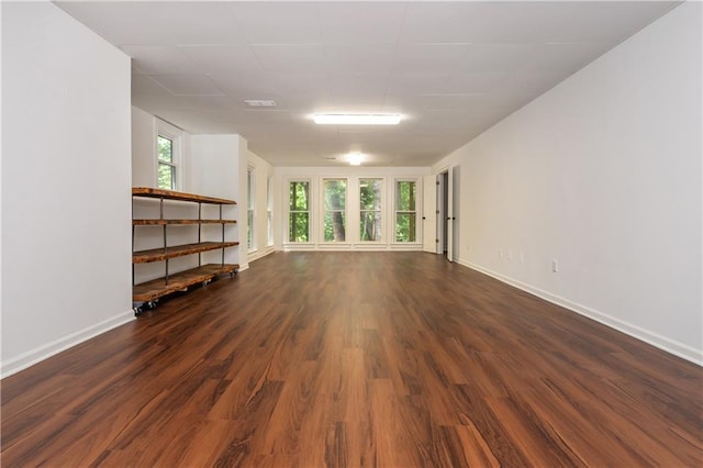 210 Hunters Vw, Roswell, GA 30075 - unfurnished living room with baseboards and dark wood finished floors