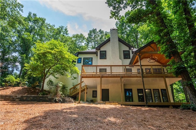 210 Hunters Vw, Roswell, GA 30075 - rear view of house featuring a chimney, stucco siding, a deck, and stairs