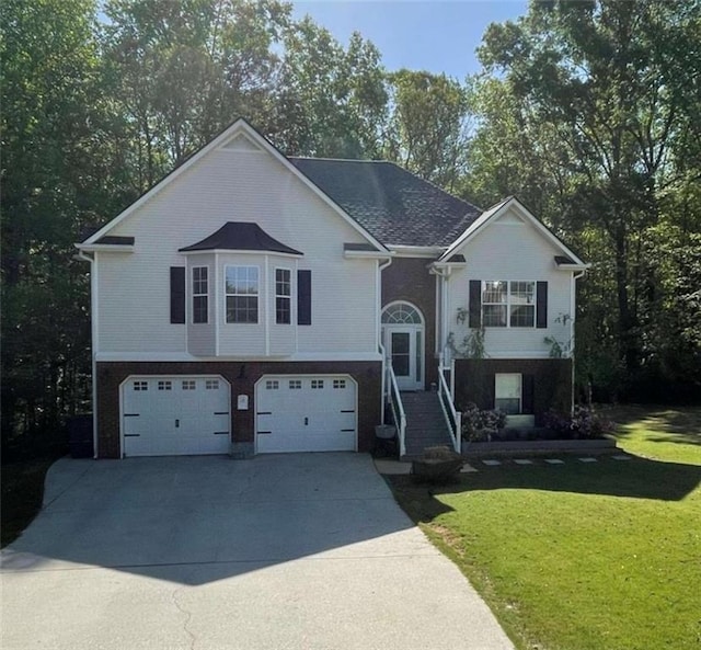 40 Legend Creek Chase, Douglasville, GA 30134 - split foyer home with a garage, a front lawn, driveway, and brick siding
