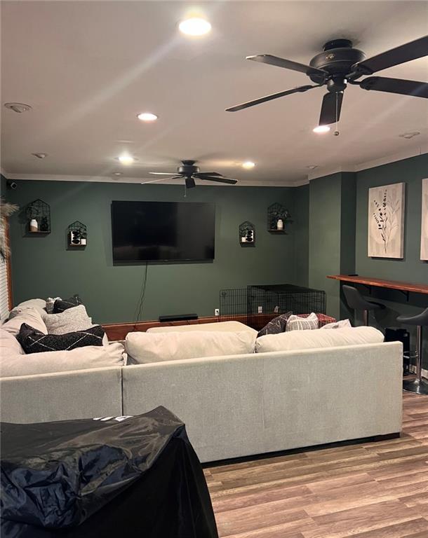 40 Legend Creek Chase, Douglasville, GA 30134 - cinema with ceiling fan, crown molding, light wood-style floors, and recessed lighting