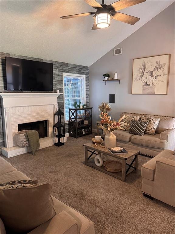 40 Legend Creek Chase, Douglasville, GA 30134 - living room with carpet floors, ceiling fan, vaulted ceiling, a fireplace, and baseboards