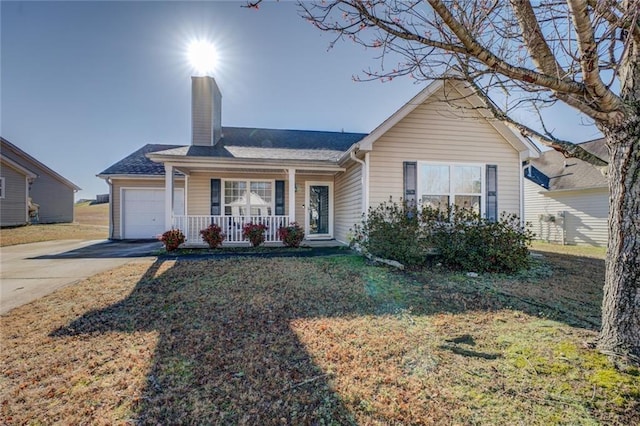 single story home with driveway, covered porch, a chimney, a front lawn, and a garage