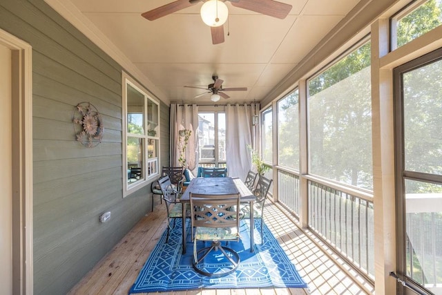 7143 Lake Edge Dr, Flowery Branch, GA 30542 - sunroom / solarium with a wealth of natural light, a ceiling fan, and outdoor dining area