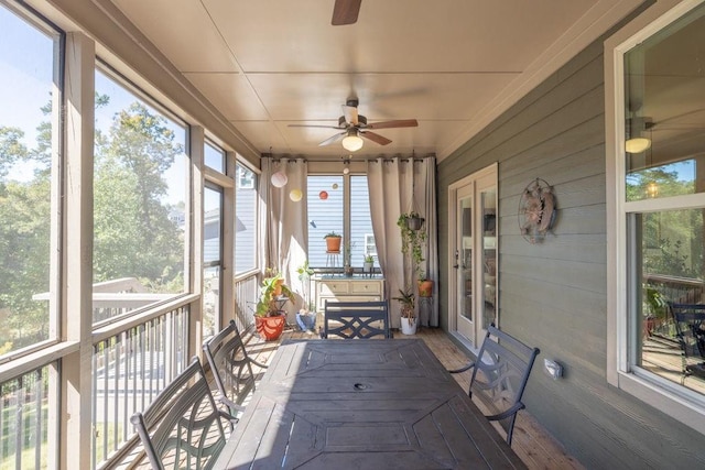7143 Lake Edge Dr, Flowery Branch, GA 30542 - sunroom with a ceiling fan and a healthy amount of sunlight
