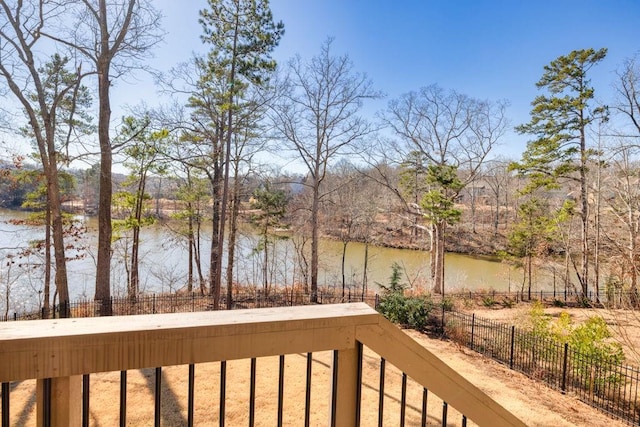 7143 Lake Edge Dr, Flowery Branch, GA 30542 - wooden deck featuring fence and a water view