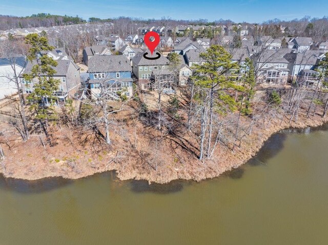 7143 Lake Edge Dr, Flowery Branch, GA 30542 - bird's eye view featuring a residential view and a water view