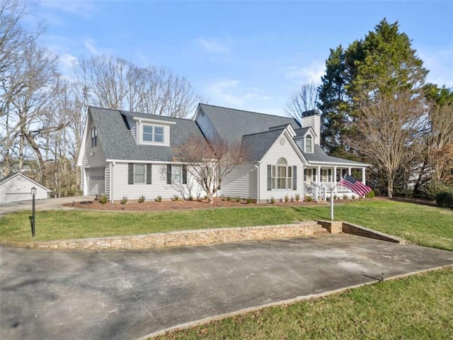 cape cod house with a front yard and a porch