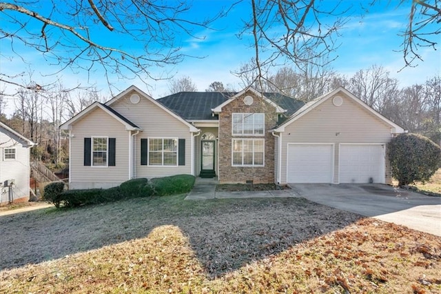 ranch-style home with a garage and a front lawn