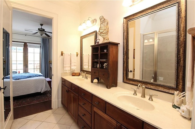 bathroom with french doors, ornamental molding, vanity, a shower with door, and tile patterned flooring