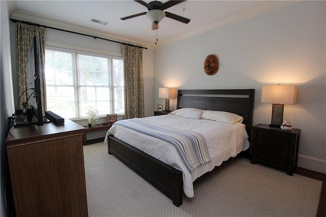 bedroom featuring crown molding and ceiling fan