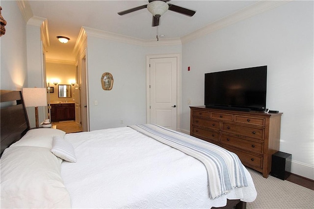 bedroom with ceiling fan, ensuite bathroom, and ornamental molding