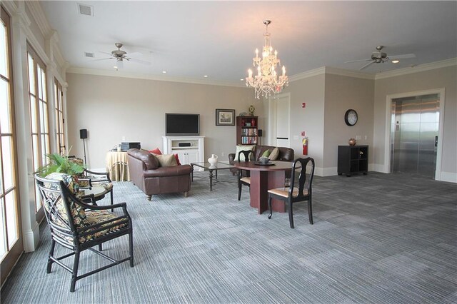 living room featuring ceiling fan with notable chandelier, a healthy amount of sunlight, elevator, and dark carpet