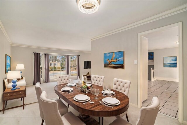 dining area with light colored carpet and ornamental molding