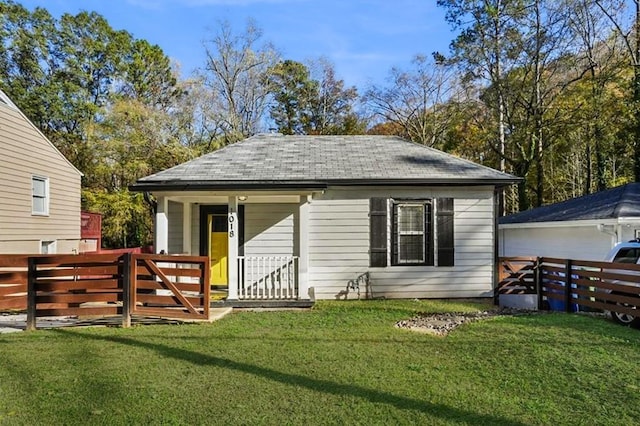 view of outbuilding with fence