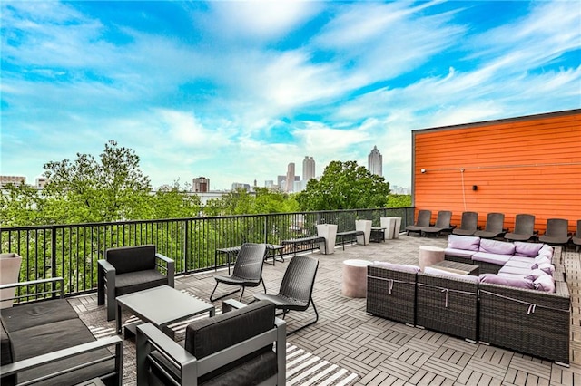 view of patio featuring a view of city and an outdoor hangout area