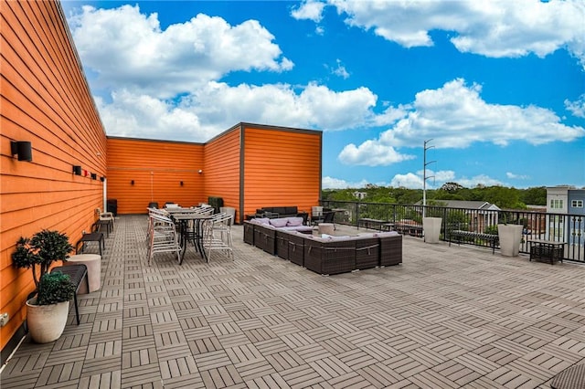 view of patio / terrace featuring outdoor dining area and an outdoor hangout area