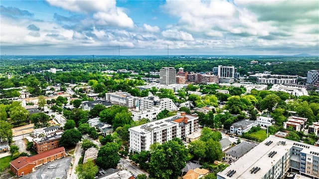 birds eye view of property with a view of city