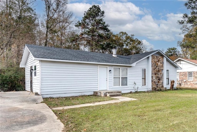 view of front of home with a front yard