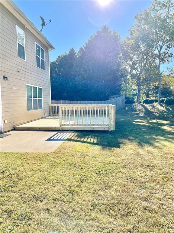 view of yard with a wooden deck