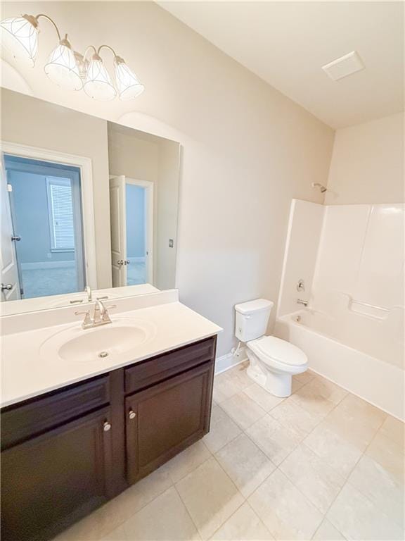 full bathroom with vanity, tile patterned floors, bathing tub / shower combination, and toilet