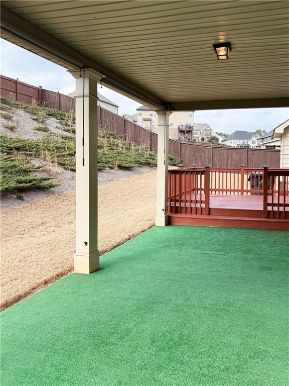 view of yard with a wooden deck