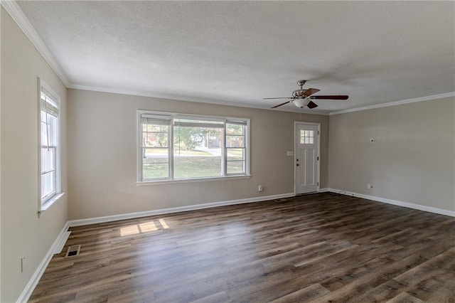 unfurnished living room featuring ornamental molding, dark hardwood / wood-style flooring, a textured ceiling, and ceiling fan